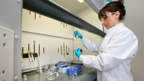 woman in mycotoxin laboratory